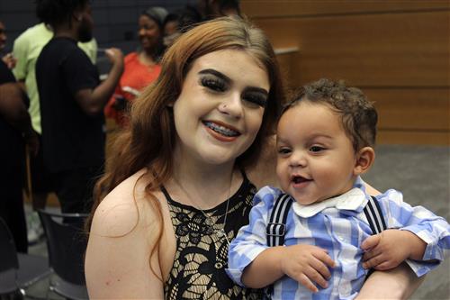 Woman holding a baby boy